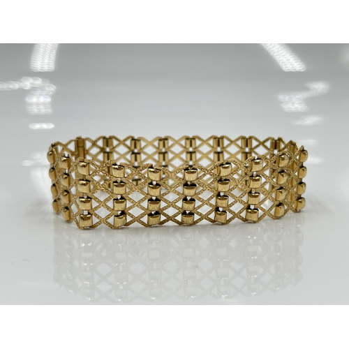 1153 - A 9ct gold gate bracelet - approx. gross weight 15.96 grams