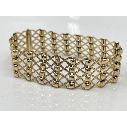 1153 - A 9ct gold gate bracelet - approx. gross weight 15.96 grams