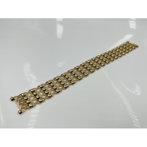 1153 - A 9ct gold gate bracelet - approx. gross weight 15.96 grams