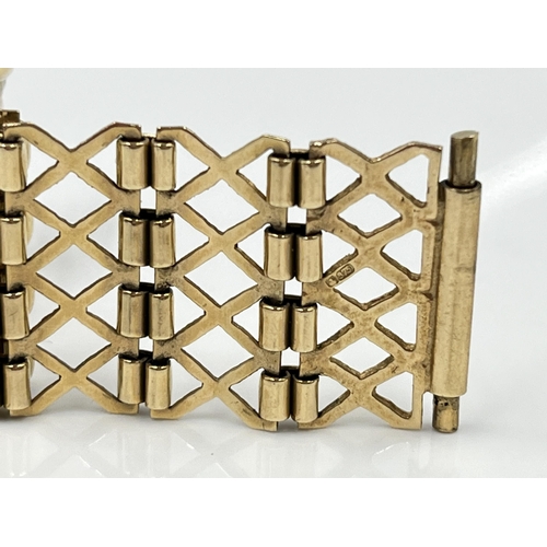 1153 - A 9ct gold gate bracelet - approx. gross weight 15.96 grams