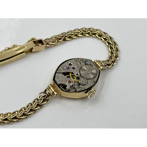 1197 - A 1930s Enicar 9ct gold cased mechanical lady's wristwatch with 9ct gold bracelet, watch dated 1936 ... 