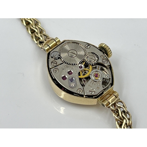 1197 - A 1930s Enicar 9ct gold cased mechanical lady's wristwatch with 9ct gold bracelet, watch dated 1936 ... 