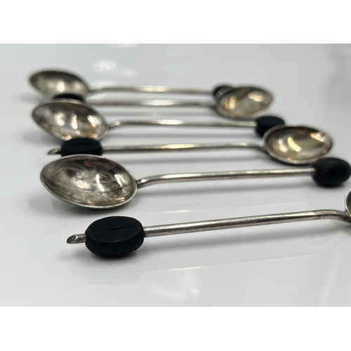 1242 - A set of six Hukin & Heath Ltd hallmarked Birmingham silver coffee bean spoons in Harrods London cas... 