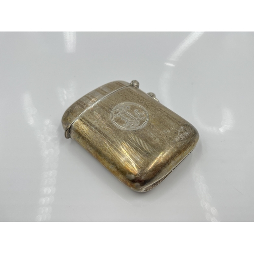 1243 - A Joseph Gloster Ltd hallmarked Birmingham silver vesta case, dated 1921 - approx. gross weight 37.6... 