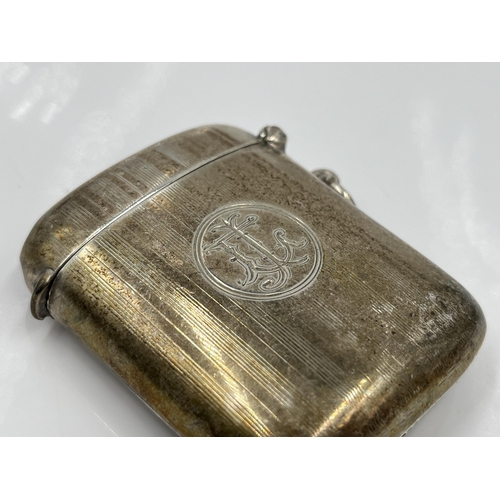 1243 - A Joseph Gloster Ltd hallmarked Birmingham silver vesta case, dated 1921 - approx. gross weight 37.6... 