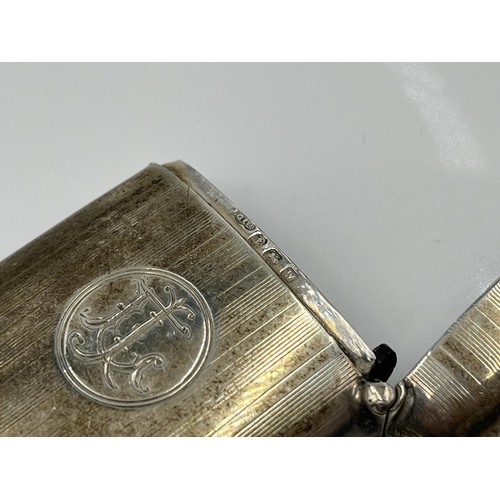 1243 - A Joseph Gloster Ltd hallmarked Birmingham silver vesta case, dated 1921 - approx. gross weight 37.6... 