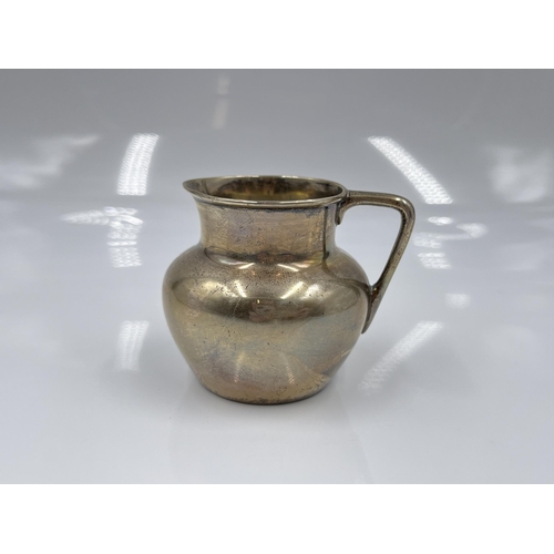 1250A - An Edwardian hallmarked London silver milk jug, dated 1910 - approx. gross weight 49.4 grams