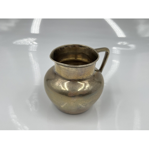 1250A - An Edwardian hallmarked London silver milk jug, dated 1910 - approx. gross weight 49.4 grams