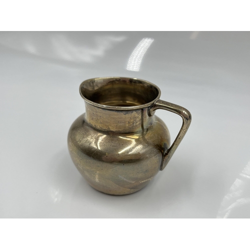 1250A - An Edwardian hallmarked London silver milk jug, dated 1910 - approx. gross weight 49.4 grams