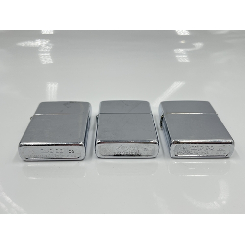 1287 - Three Zippo cigarette lighters