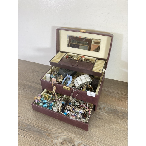 385 - A jewellery box containing costume jewellery to include boxed Equilibrium rose gold plated bracelet,... 