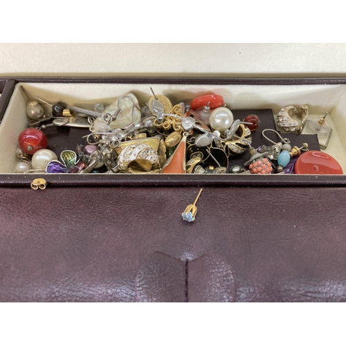 385 - A jewellery box containing costume jewellery to include boxed Equilibrium rose gold plated bracelet,... 