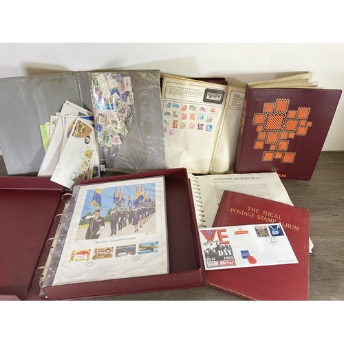 386 - A collection of First Day cover and stamp albums to include limited edition First Day lithographs, U... 