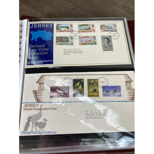 386 - A collection of First Day cover and stamp albums to include limited edition First Day lithographs, U... 