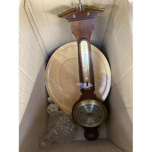 780 - Three boxes containing glass decanters, mahogany barometer etc.