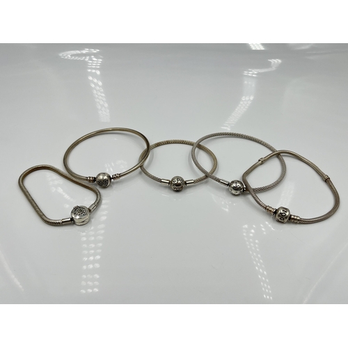 1068 - Five Pandora .925 silver bracelets - approx. gross weight 52 grams