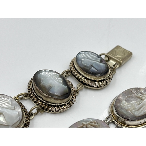 1082 - Two vintage silver and mother of pearl cameo bracelets, one .800 and one .900 - approx. gross weight... 