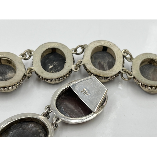 1082 - Two vintage silver and mother of pearl cameo bracelets, one .800 and one .900 - approx. gross weight... 