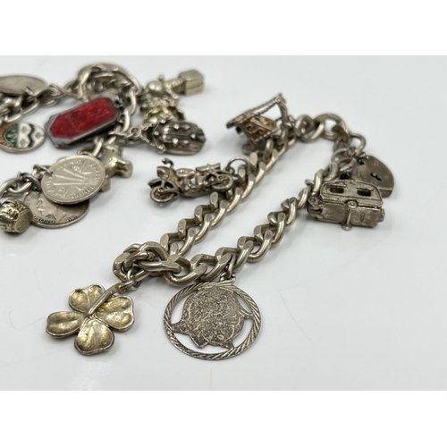 1085 - Two .925 silver charm bracelets - approx. gross weight 93.77 grams