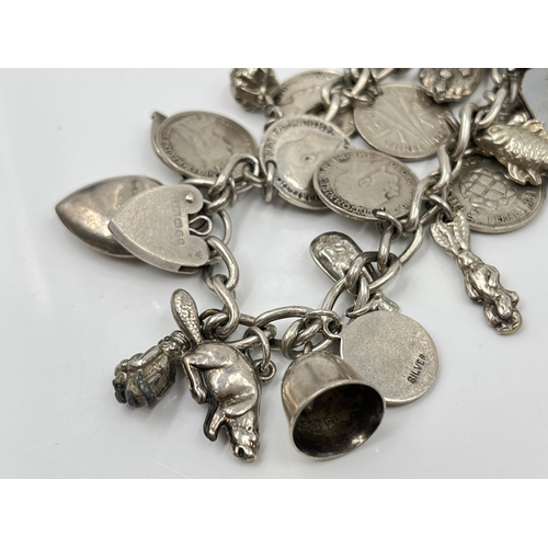 1085 - Two .925 silver charm bracelets - approx. gross weight 93.77 grams