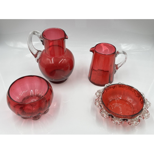 199 - Four pieces of Victorian cranberry glassware - largest approx. 15cm high