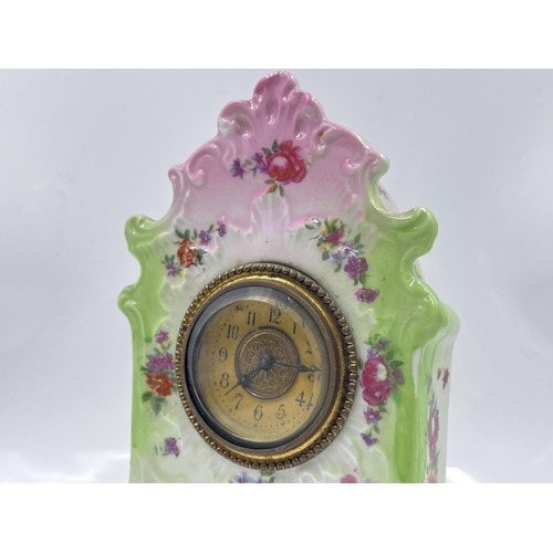 204 - A 19th century style porcelain mantel clock - approx. 21cm high