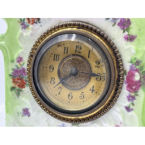 204 - A 19th century style porcelain mantel clock - approx. 21cm high