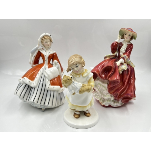 205 - Three Royal Doulton figurines, Top O'the Hill - HN 1834, What's The Matter? - HN 3684 and Noelle - H... 