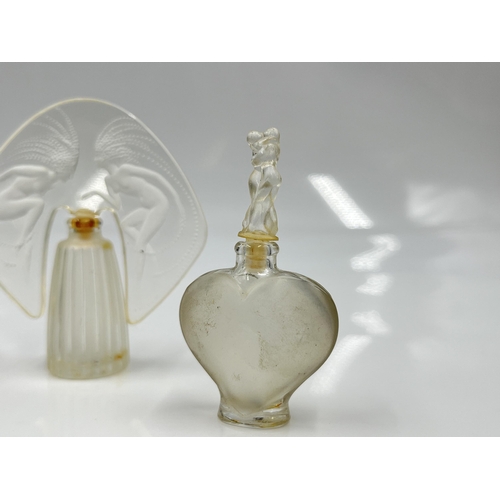 207 - A boxed Lalique The Ultimate Collection three piece scent bottle set