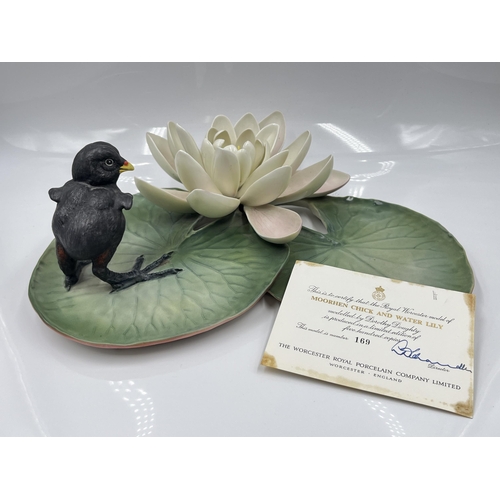 210 - A Royal Worcester Moorhen Chick and Water Lily limited edition 169/500 bone china model designed by ... 