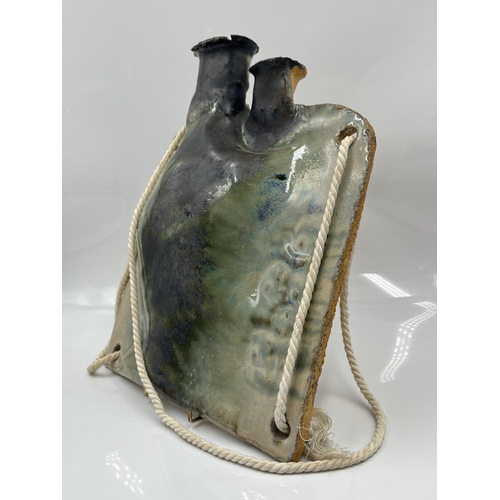 211 - A mid 20th century studio pottery wall hanging flask - approx. 29cm high x 24cm wide