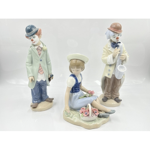 220 - Three Lladro figurines to include 