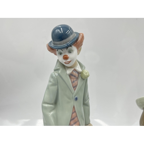 220 - Three Lladro figurines to include 