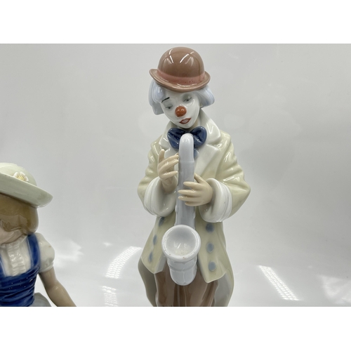 220 - Three Lladro figurines to include 