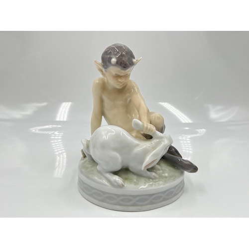 223 - A Royal Copenhagen Faun with Rabbit figurine, model no. 439 - approx. 13.5cm high