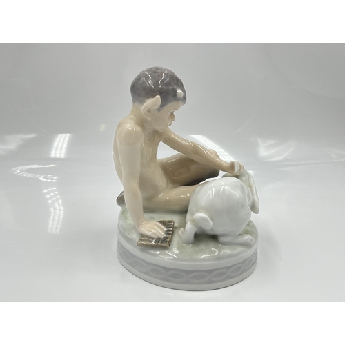 223 - A Royal Copenhagen Faun with Rabbit figurine, model no. 439 - approx. 13.5cm high