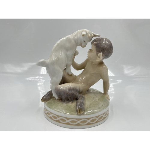 224 - A Royal Copenhagen Faun with Goat figurine, model no. 1012/498 - approx. 13cm high