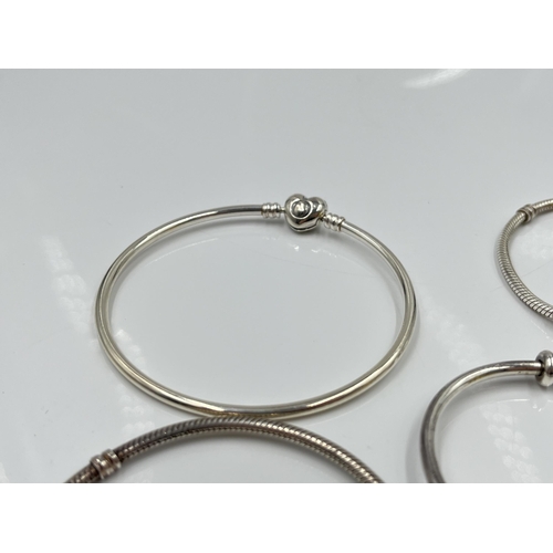 1091 - Four Pandora .925 silver bracelets - approx. gross weight 51 grams