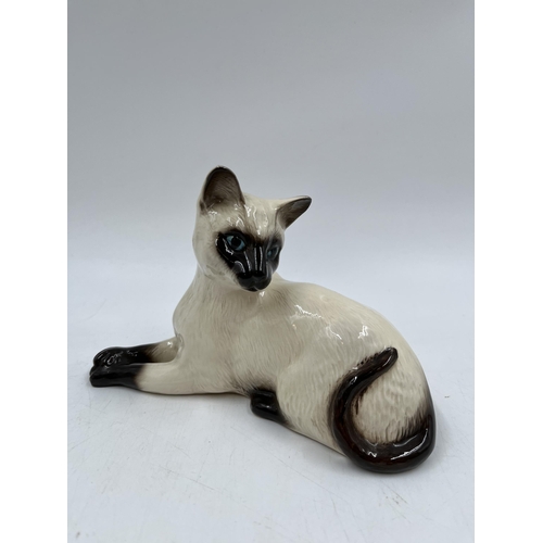 229 - A Beswick Siamese cat figurine, model no. 1558 - approx. 12cm high