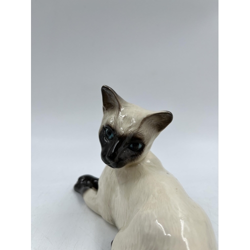 229 - A Beswick Siamese cat figurine, model no. 1558 - approx. 12cm high