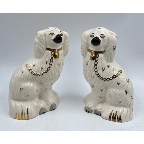 232 - A pair of Royal Doulton Staffordshire spaniel dog figurines, model no. 1378-4 - approx. 23cm high