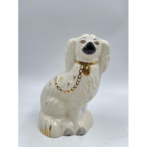 232 - A pair of Royal Doulton Staffordshire spaniel dog figurines, model no. 1378-4 - approx. 23cm high