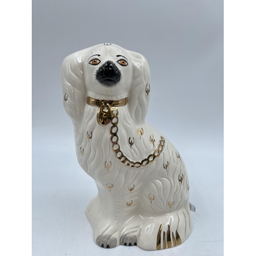 232 - A pair of Royal Doulton Staffordshire spaniel dog figurines, model no. 1378-4 - approx. 23cm high