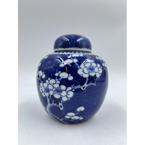 233 - A Chinese Prunus Blossom pattern porcelain ginger jar and cover - approx. 15cm high