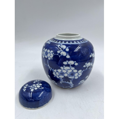 233 - A Chinese Prunus Blossom pattern porcelain ginger jar and cover - approx. 15cm high