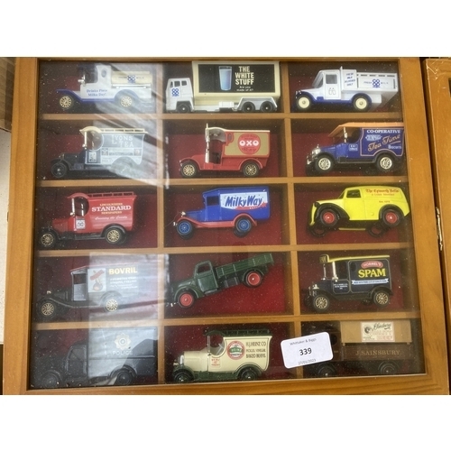 339 - Nine hardwood display cases containing a large collection of various diecast model vehicles