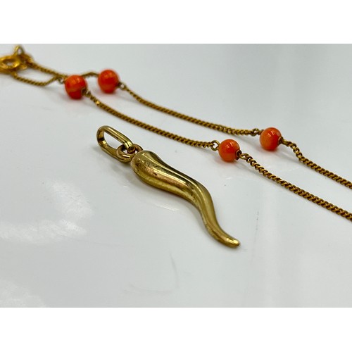 1130 - Two pieces of 9ct gold jewellery, one coral beaded bracelet and one pendant - approx. gross weight 2... 