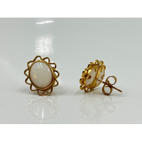 1141 - A pair of 9ct gold opal earrings - approx. gross weight 1.75 grams