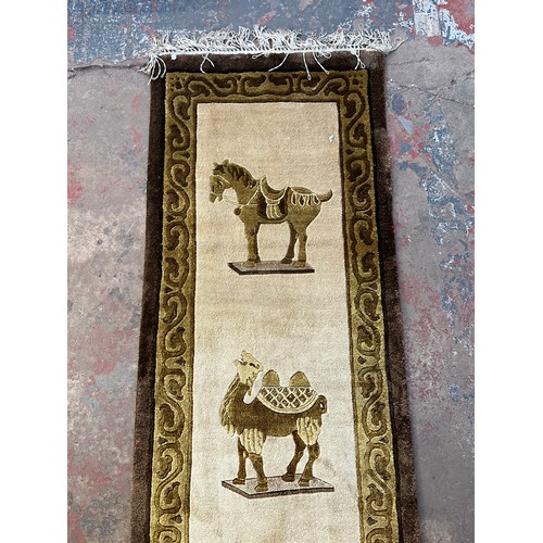 89 - A Middle Eastern style hall runner - approx. 210cm long x 47cm wide