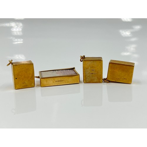 1143 - Four 9ct gold cased emergency money charms - approx. gross weight 10.71 grams